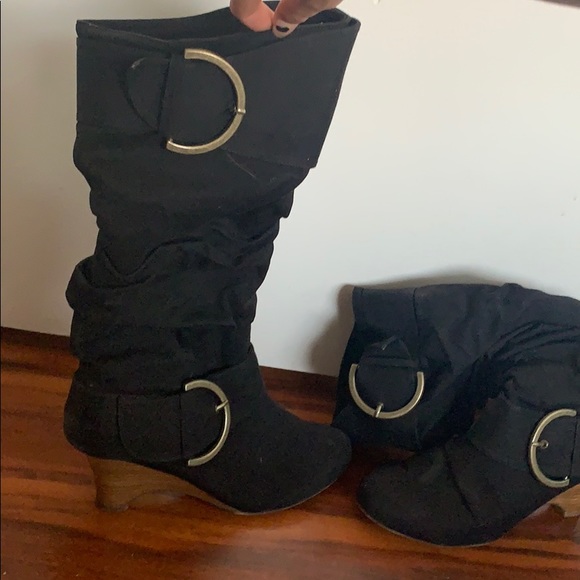 high rise black boots